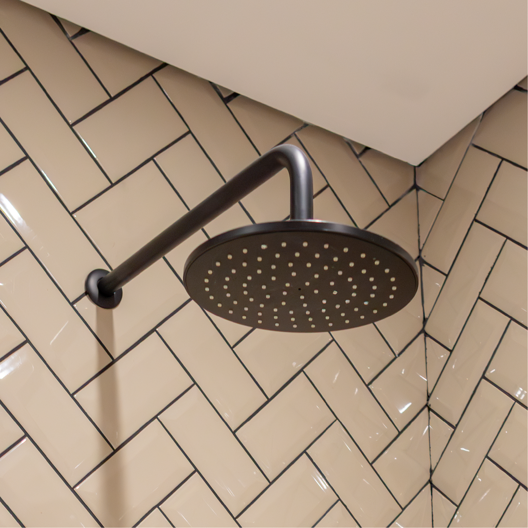 Brazo y cabeza de ducha redonda